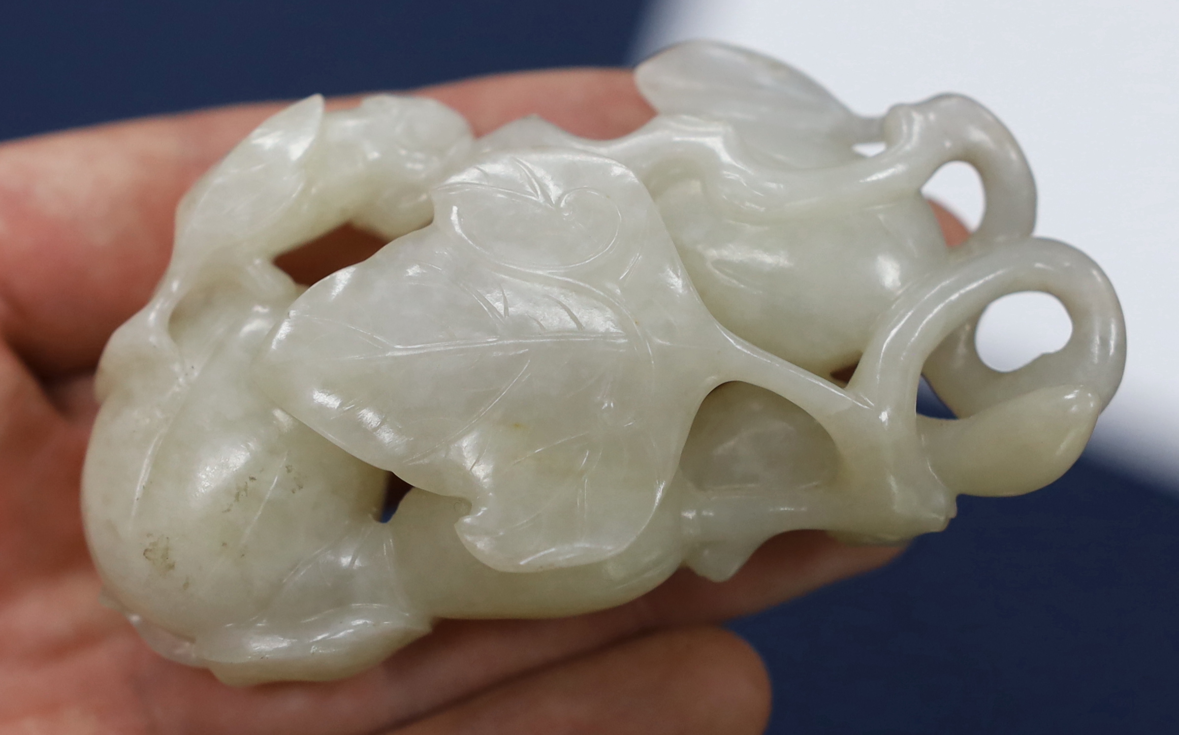 A Chinese white jade carving of a cluster of melons, 18th century